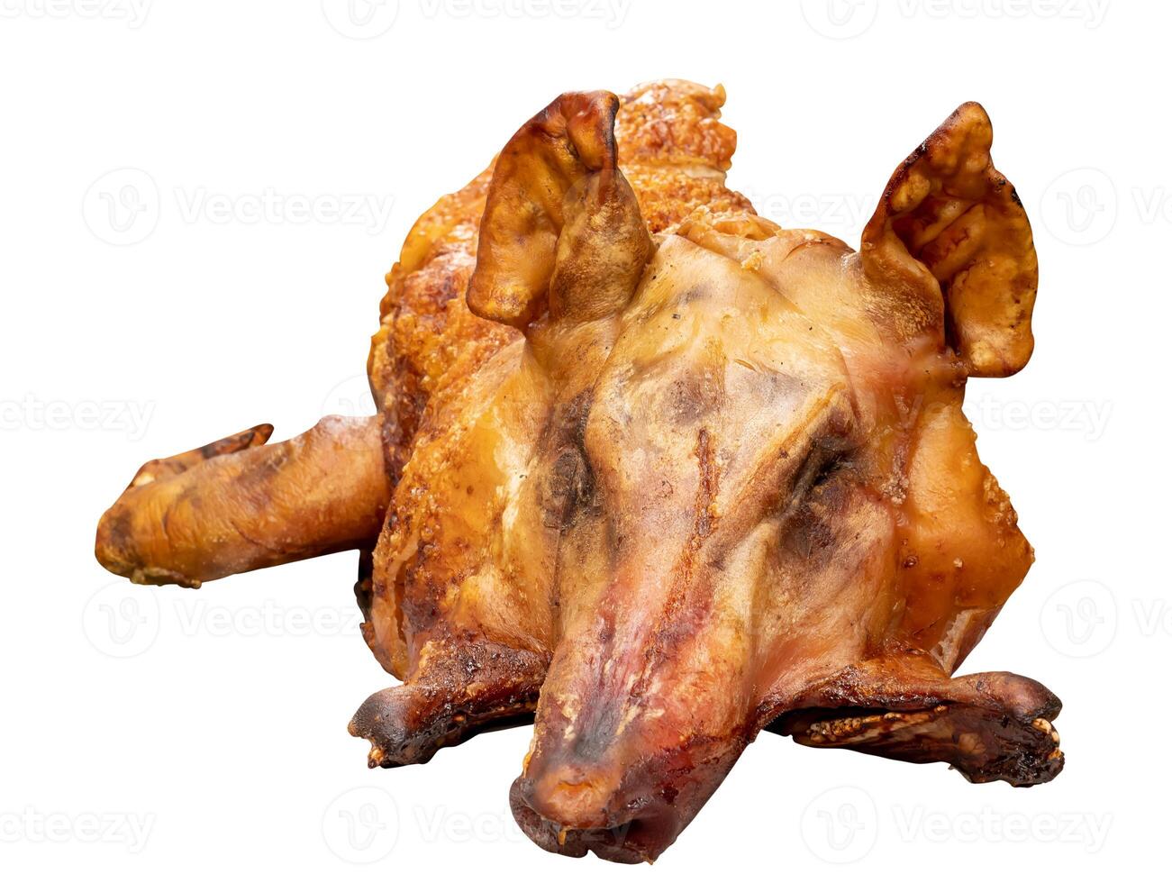 Whole roasted suckling pig isolated on white background with clipping path photo