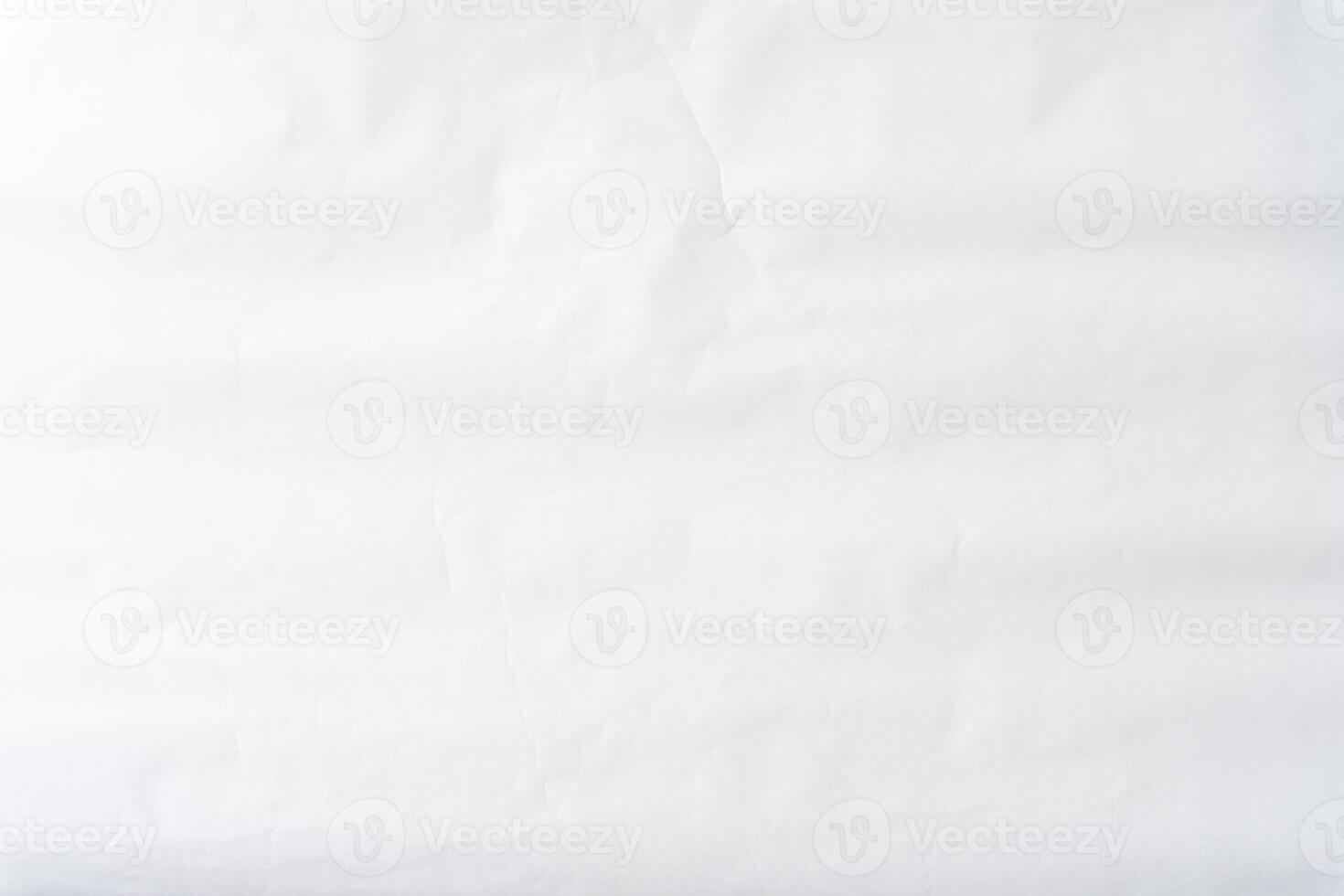 Top view of wrinkled or crumpled white stencil paper texture used for wrinkled or crumpled white paper background texture in decorative art work photo