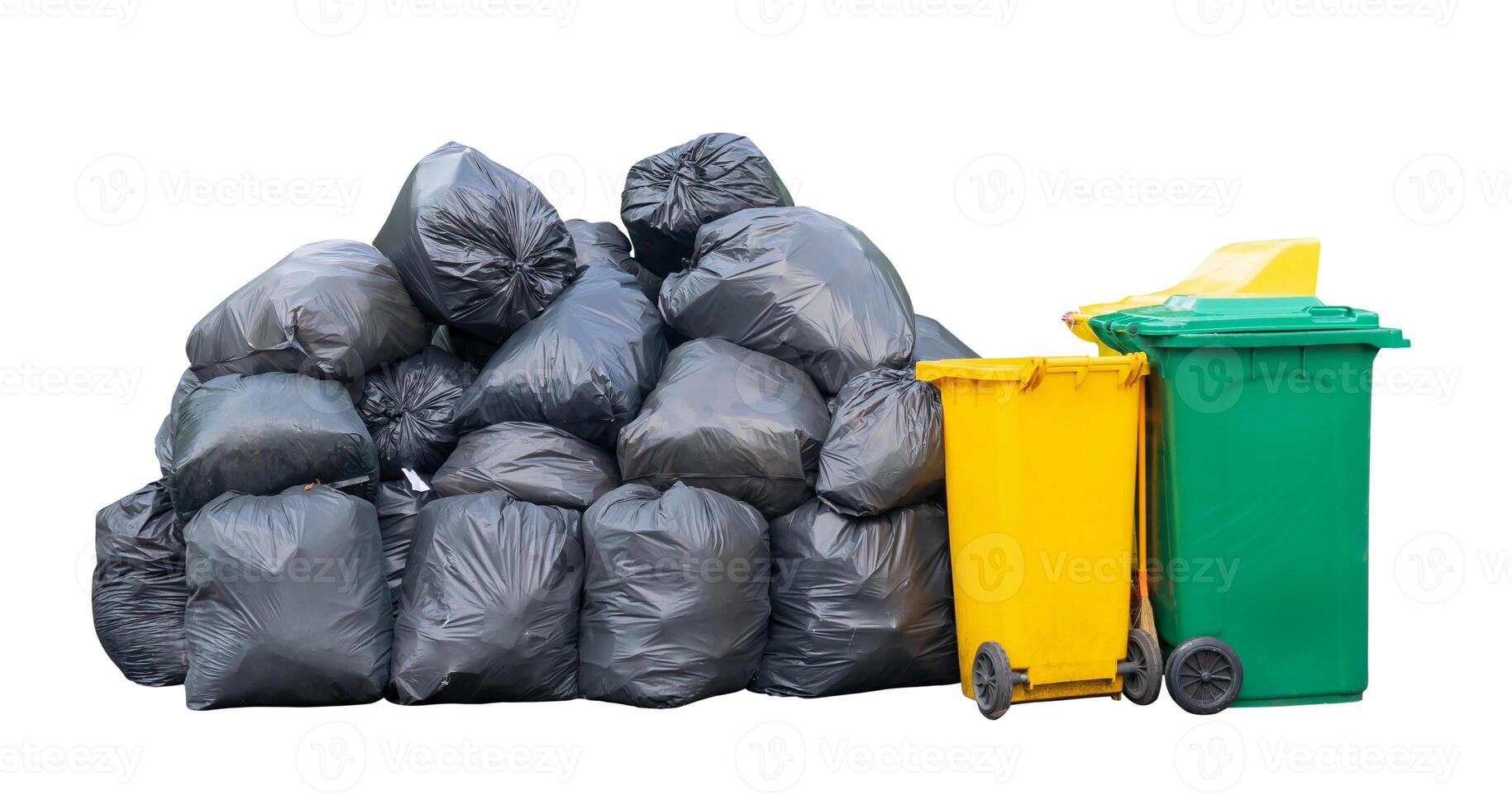 Front view of giant stack of garbage in black plastic bag with wheeled plastic bin or can isolated on white background with clipping path photo