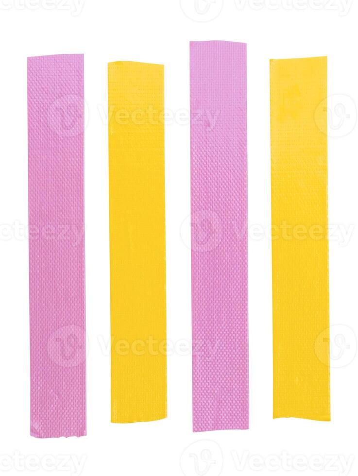 Top view set of pink and yellow adhesive vinyl tape or clothes tape in stripe shape isolated on white background with clipping path photo