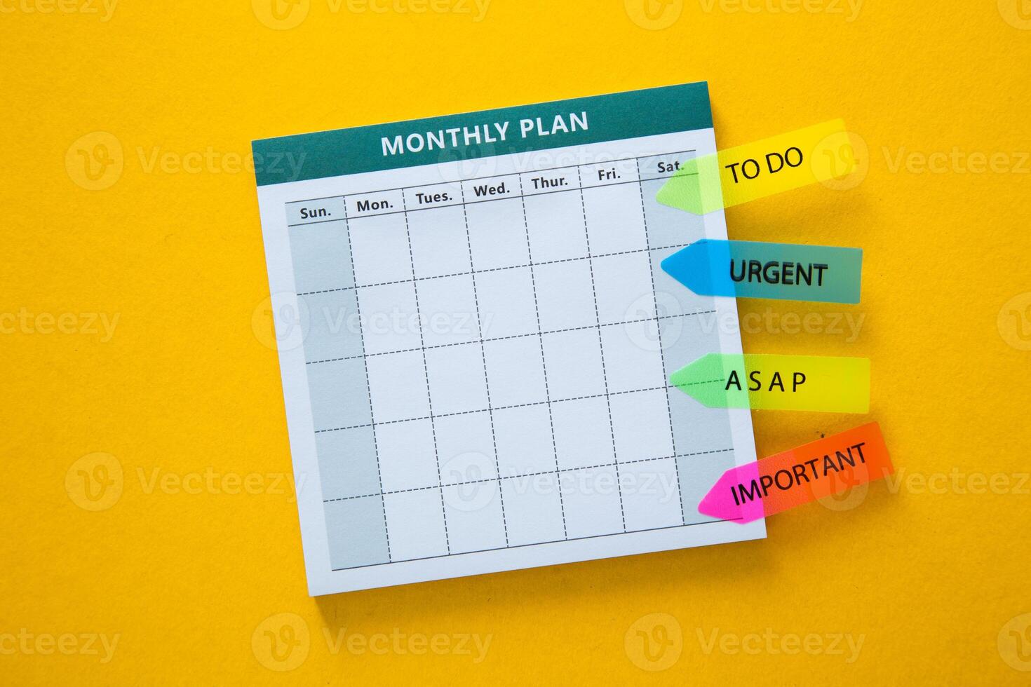 Colorful monthly planner with urgency stickers photo