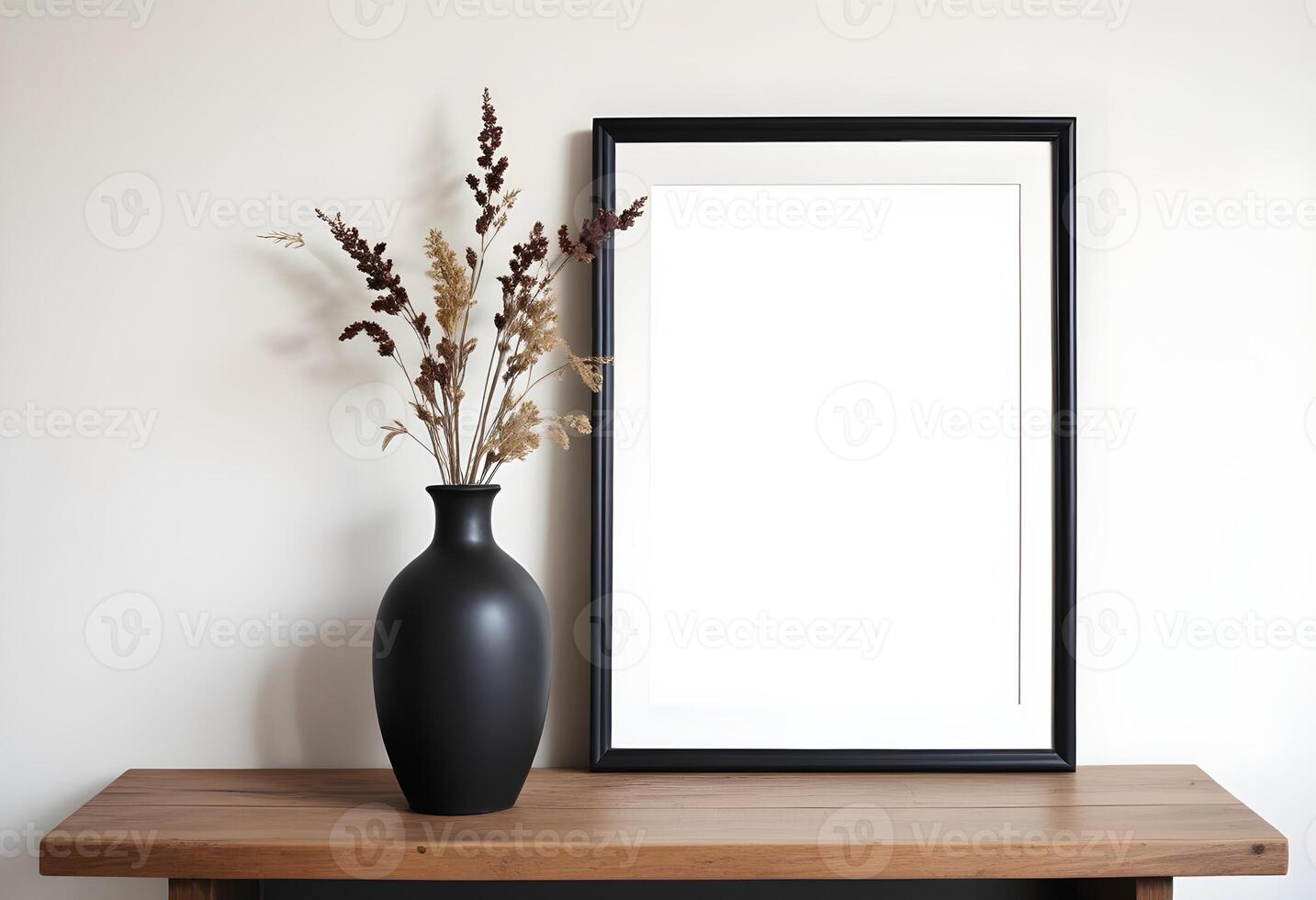 Elegant Wall art black frame mock up with black vases on the wooden table photo