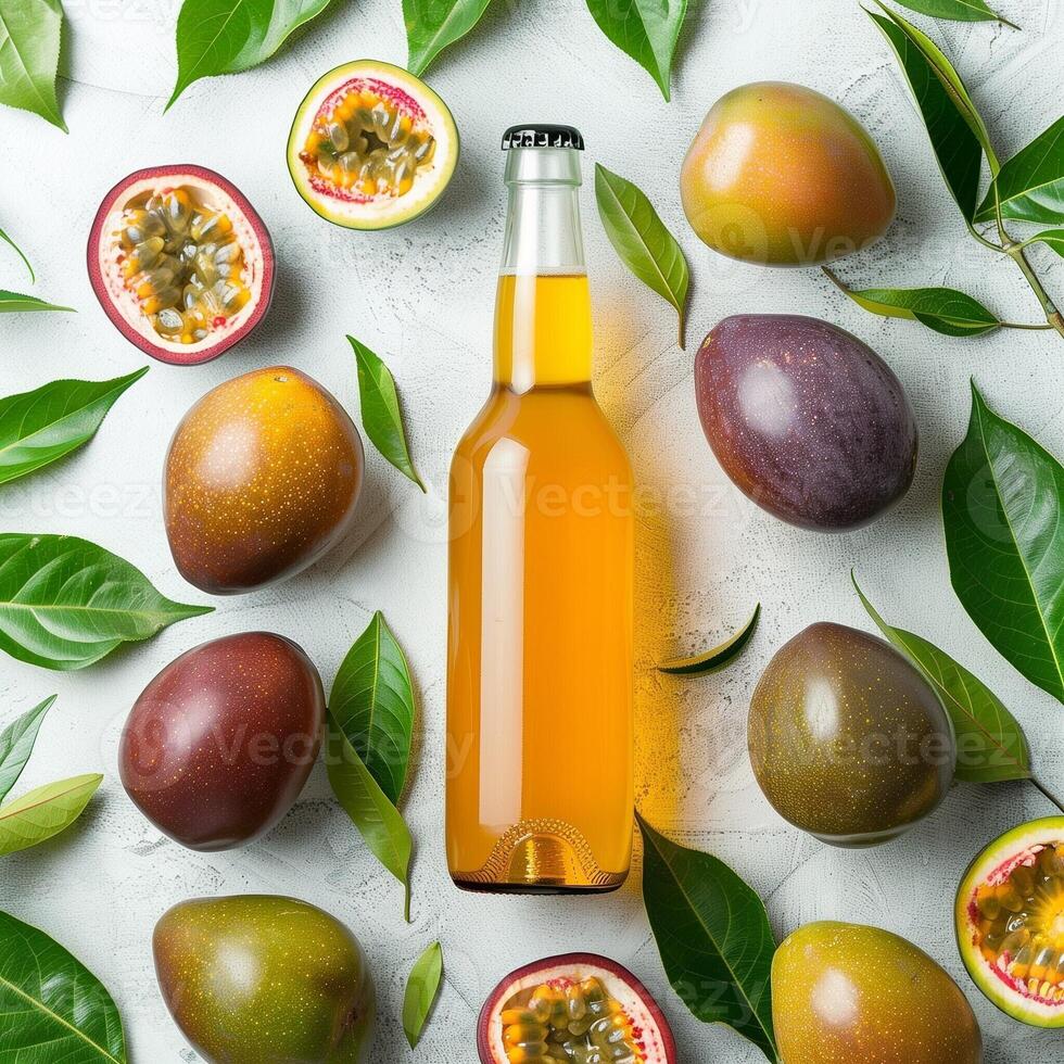 Bottle of passion fruit juicy amidst passion fruits in clean background with green leaves. Copy space photo