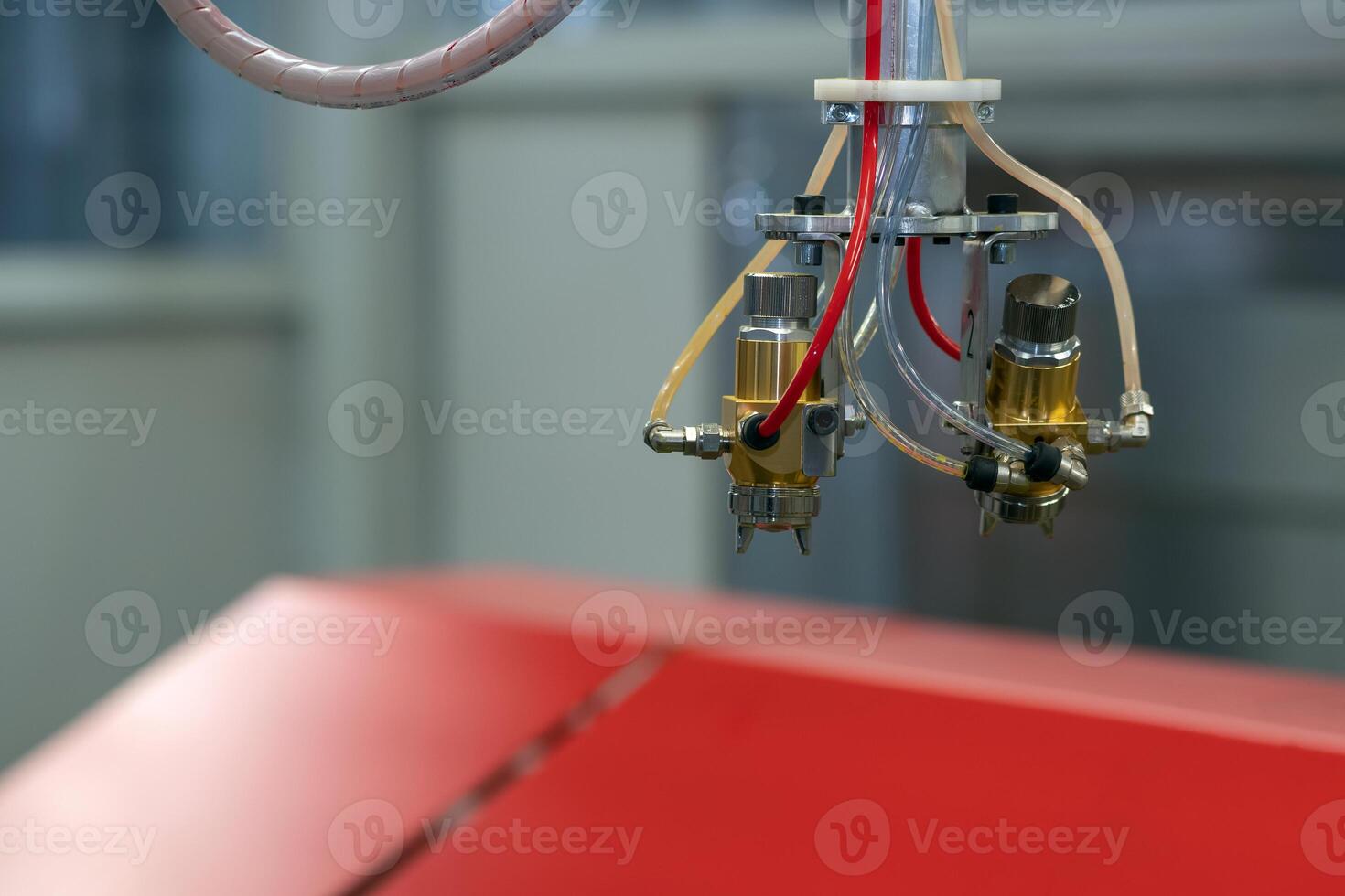 spray head in automatic paint booth photo