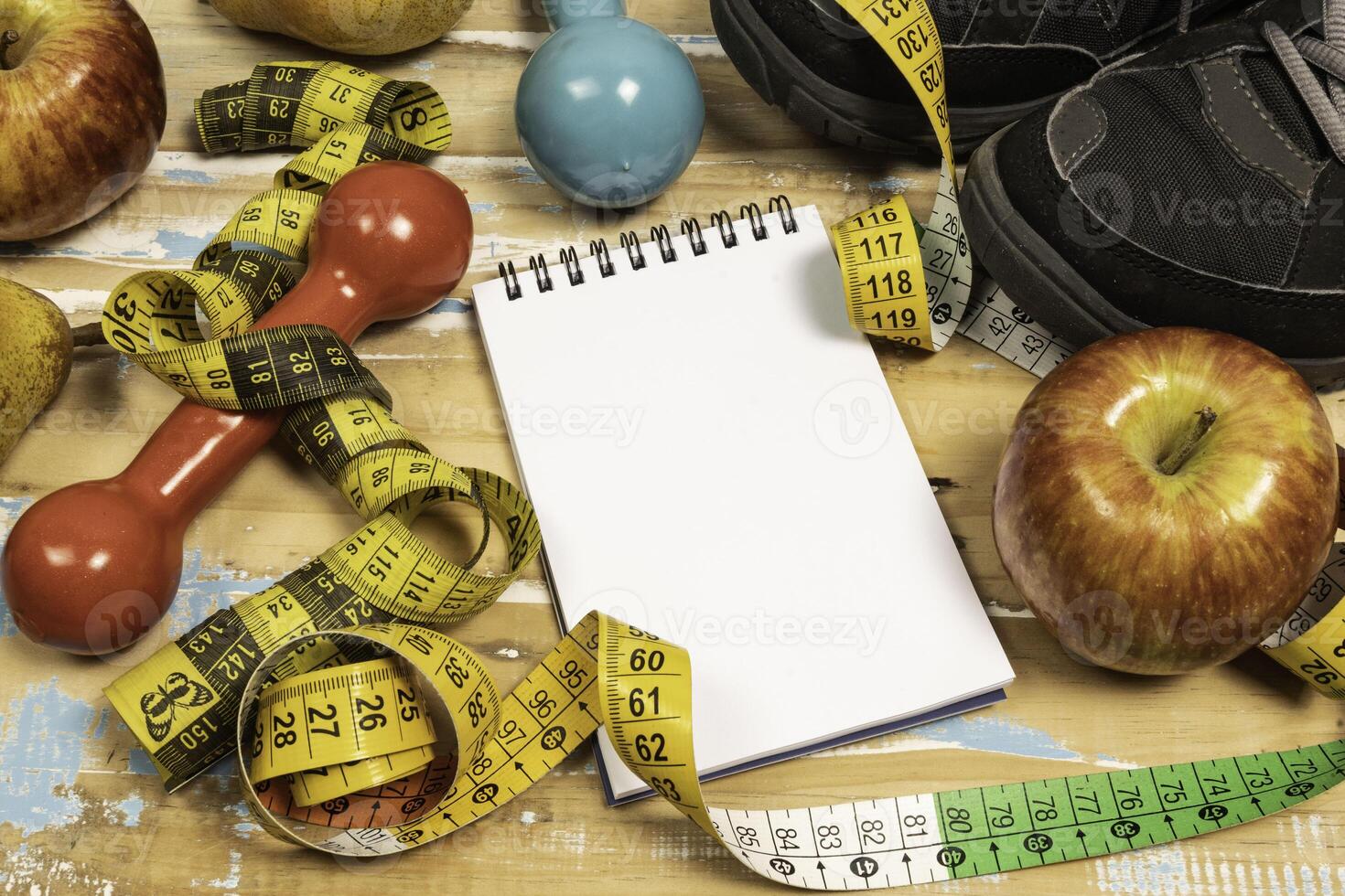 fruit for weight loss with measuring tape and equipment for exercise and diet, weight loss photo