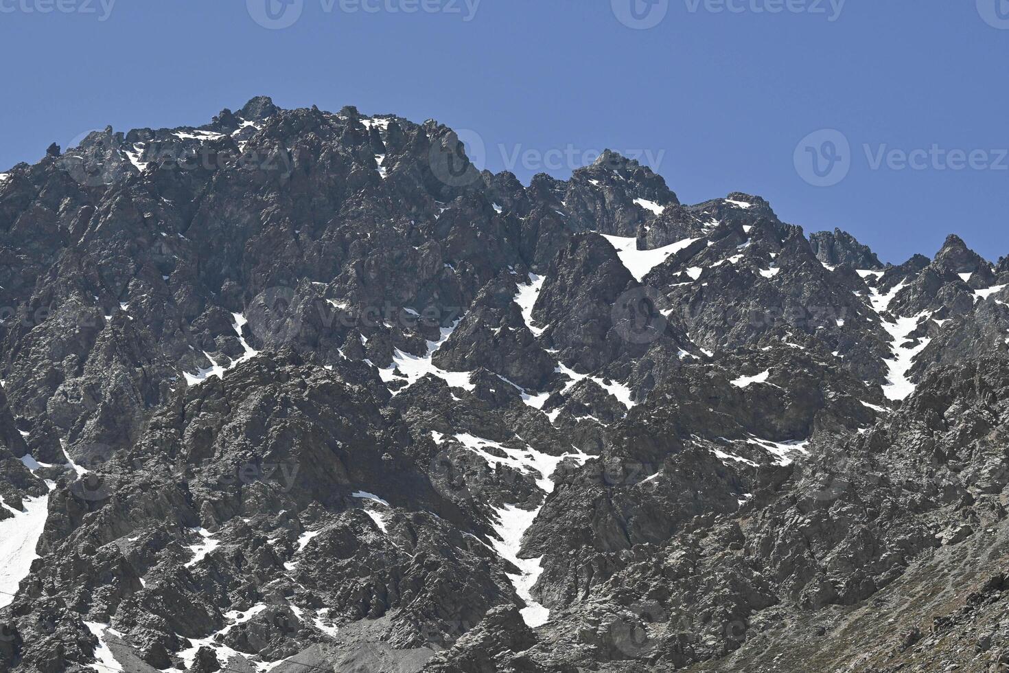 View of mountains in the Andes mountain range near Portillo in summer photo
