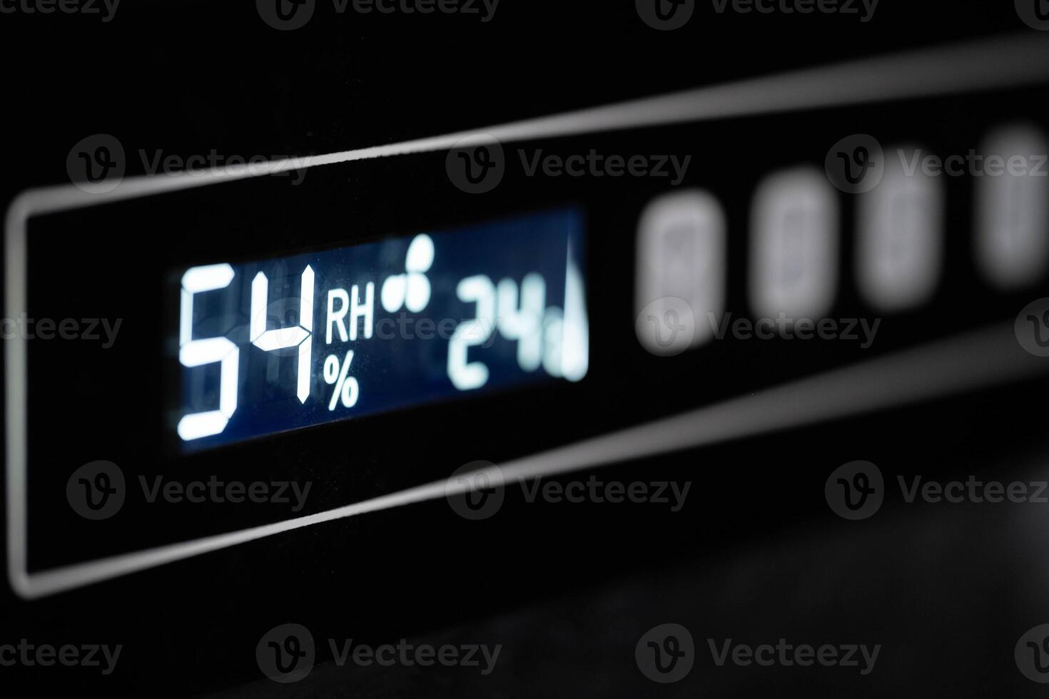 Digital display showing humidity and temperature photo