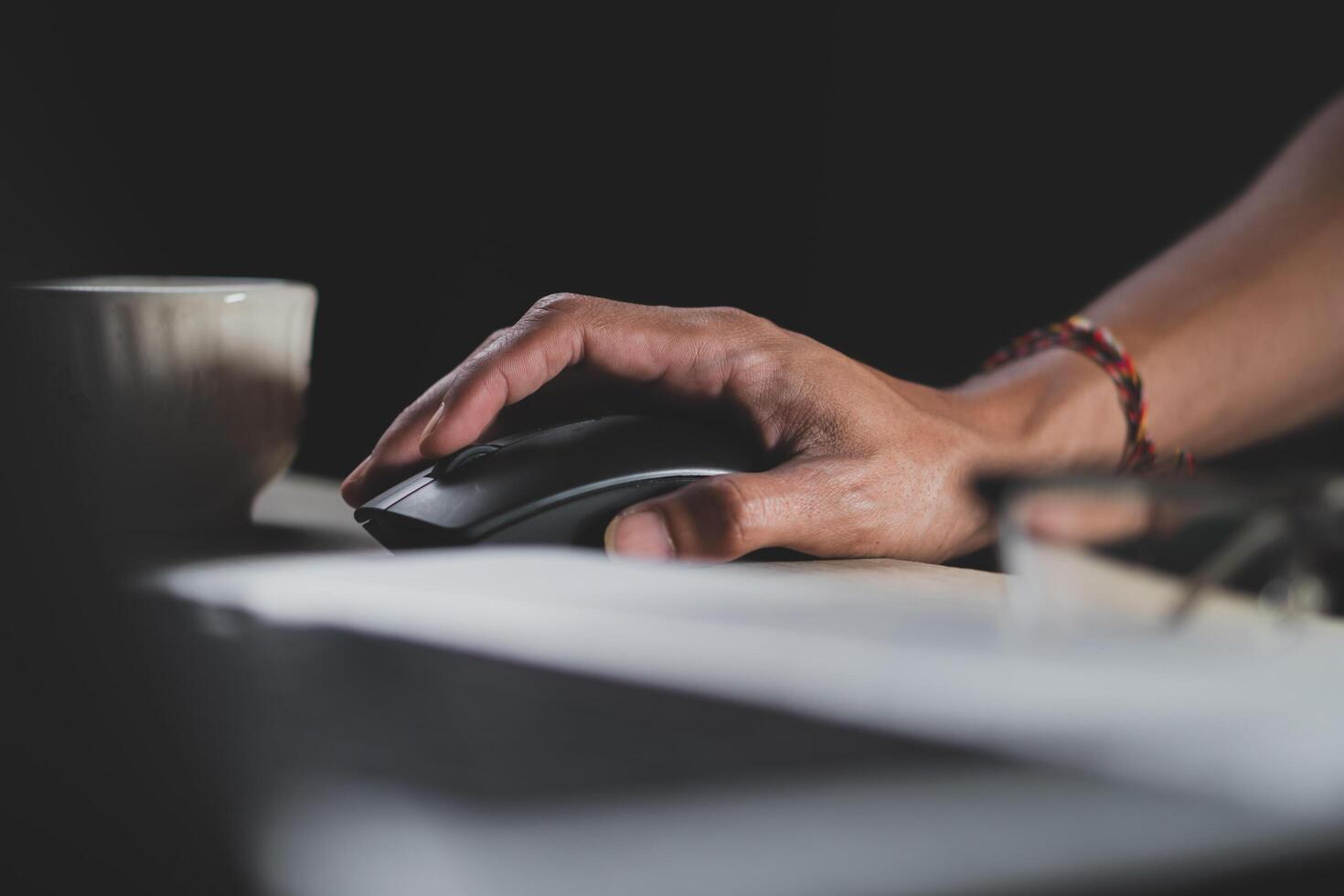 Picture of male hand on computer mouse photo