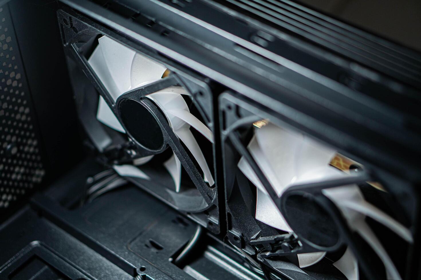 Close-up of Computer Cooling Fans Inside PC Case photo