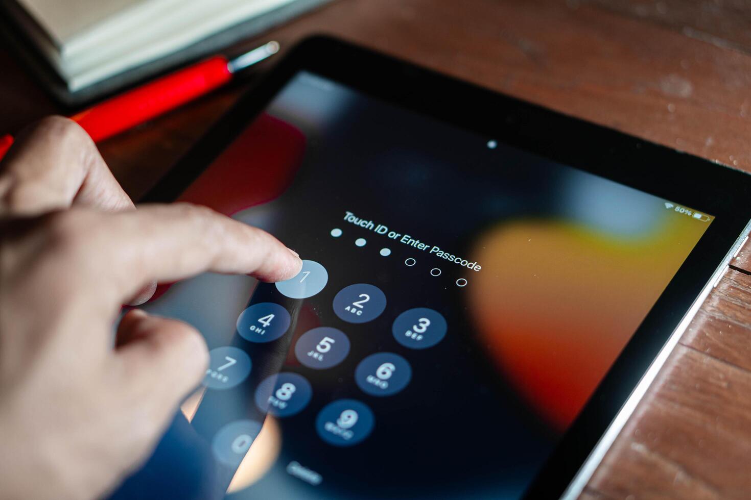 Entering passcode on tablet photo