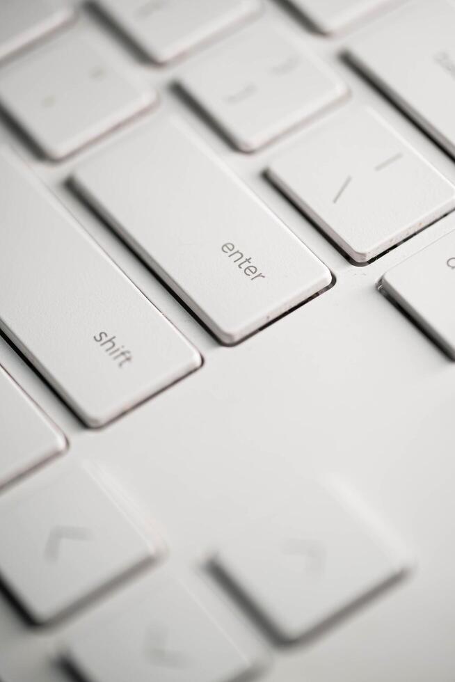 Computer keyboard and on the desk close up. photo