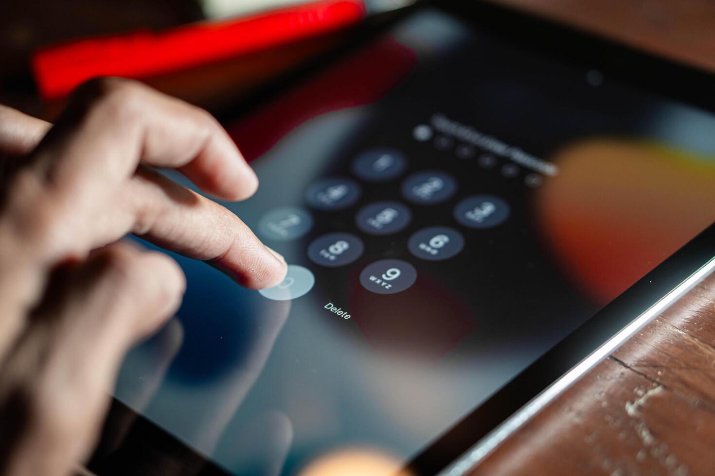 Entering passcode on a tablet photo