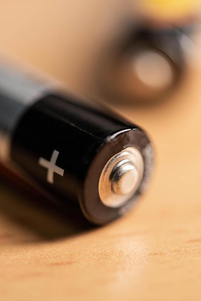 closeup of golden and silver aa alkaline batteries photo