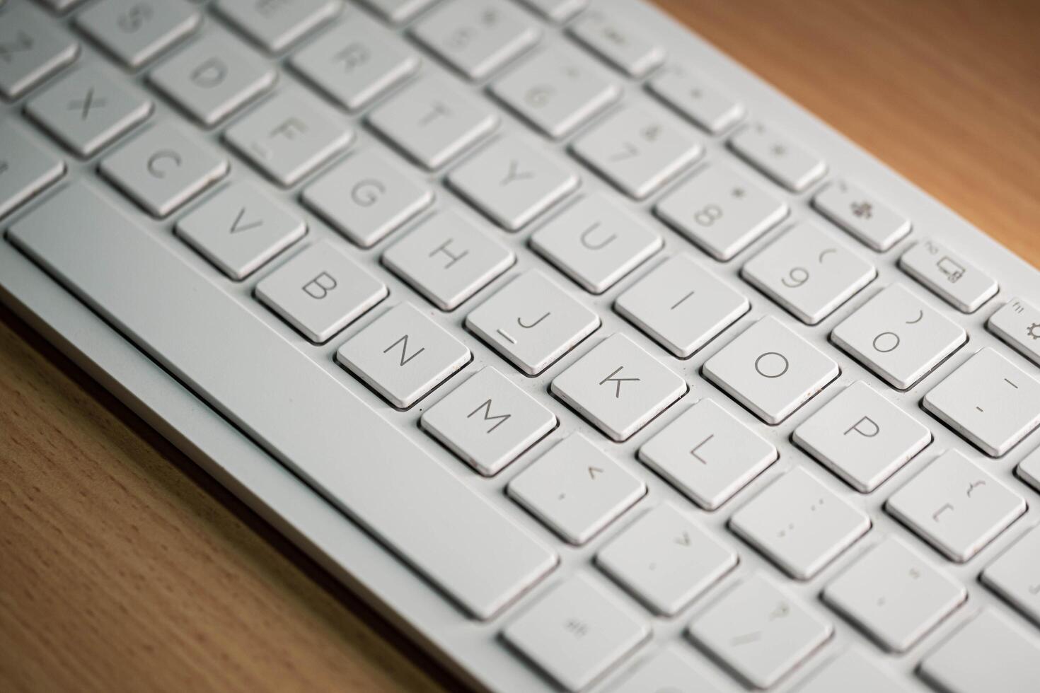 Computer keyboard and on the desk close up. photo