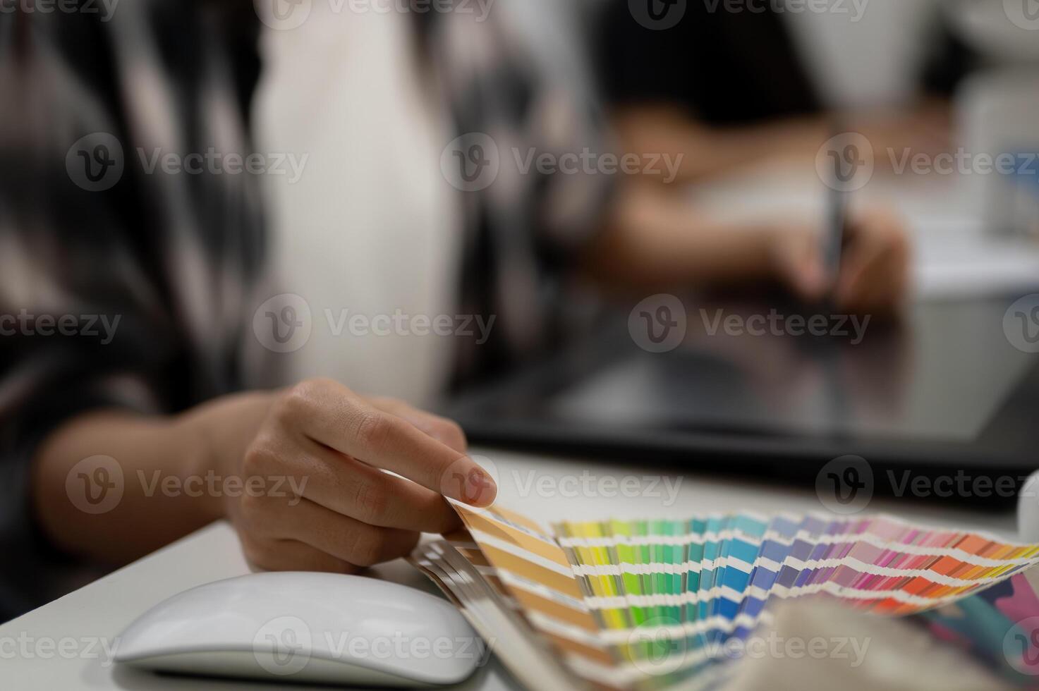 Cropped image of a professional female graphic designer illustrator artist working in the office. photo