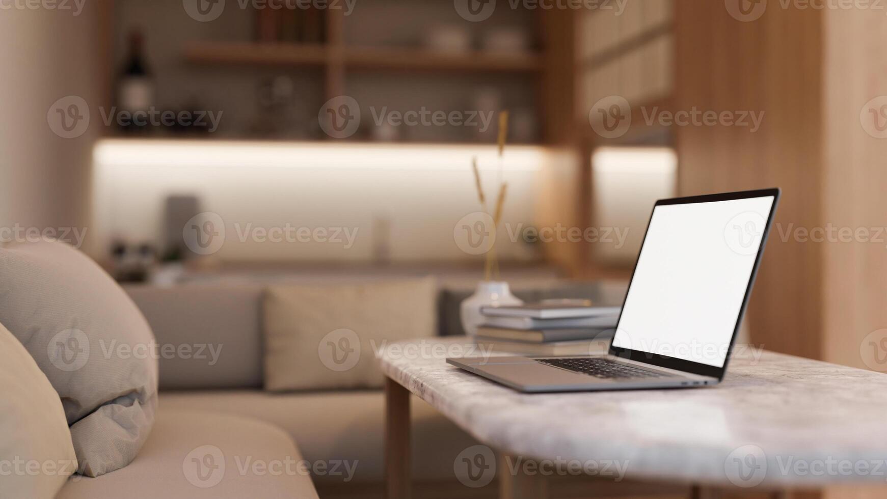 Side view image of a white-screen laptop computer on a coffee table in a modern and cosy living room photo