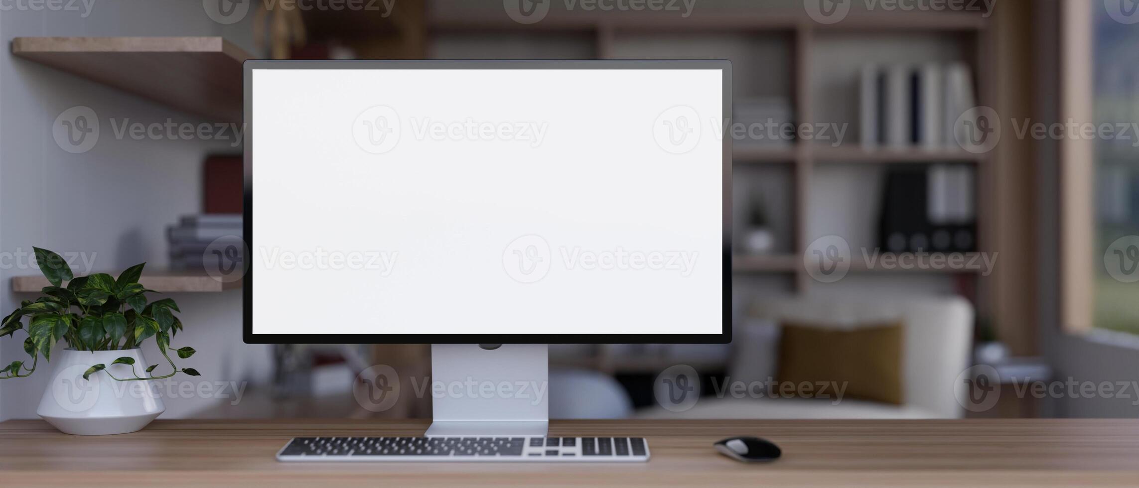 Front view image of a white-screen computer mockup on a wooden table in a modern living room. photo