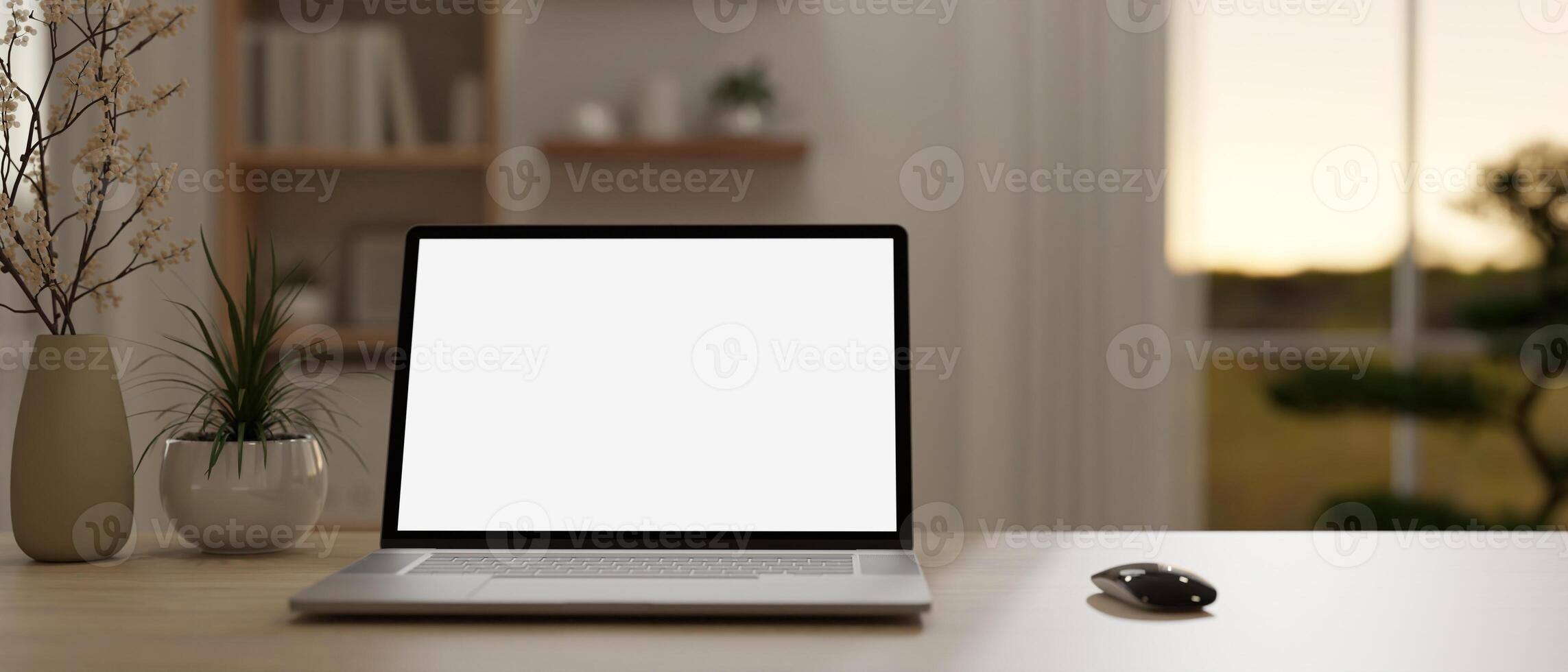 Close-up image of a white-screen laptop on a wooden table in a modern, minimalist living room. photo