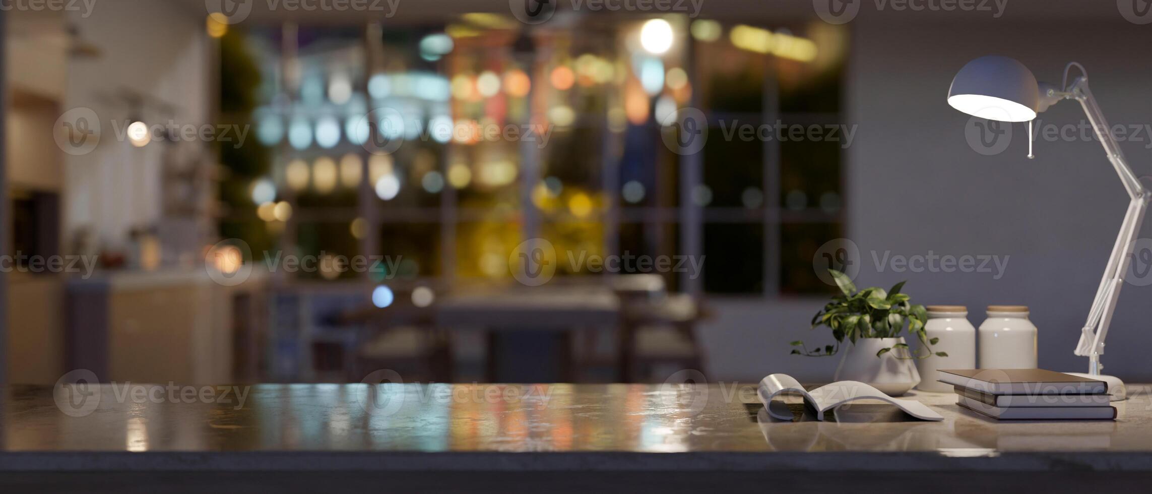 Copy space on a study table or working desk in a modern dark living room at night. photo