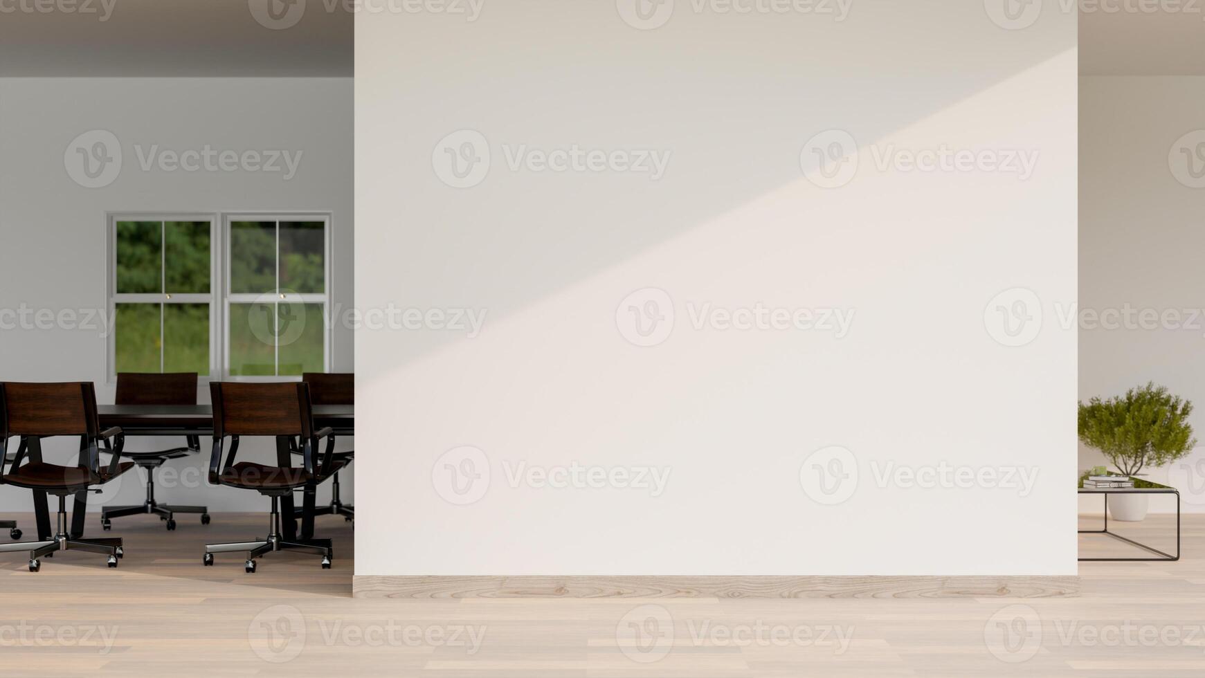 A minimalist office corridor features a parquet floor, a white empty wall, and a meeting room. photo