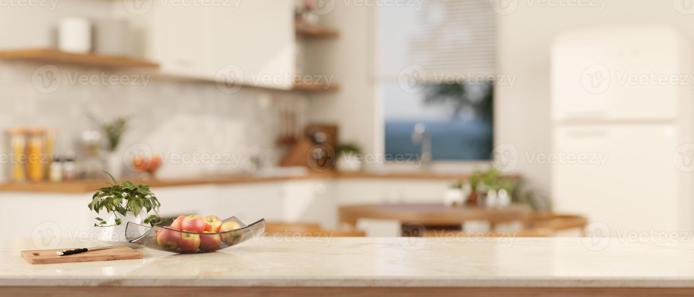 A copy space on a luxury white marble kitchen tabletop in a modern white kitchen. close-up image photo