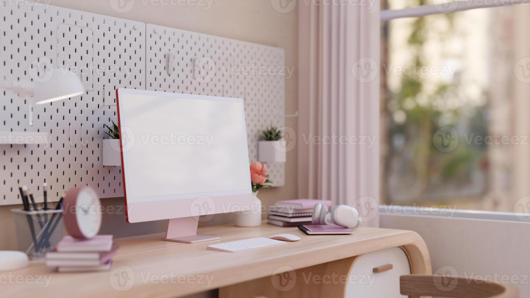 A beautiful female home study table or working desk in pink with a pink computer mockup. photo