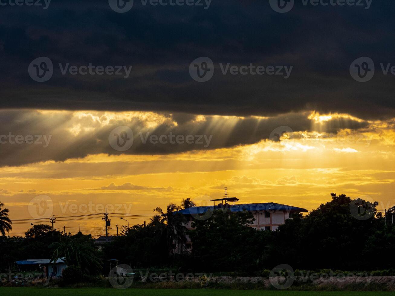 lights passing through clouds on the field photo