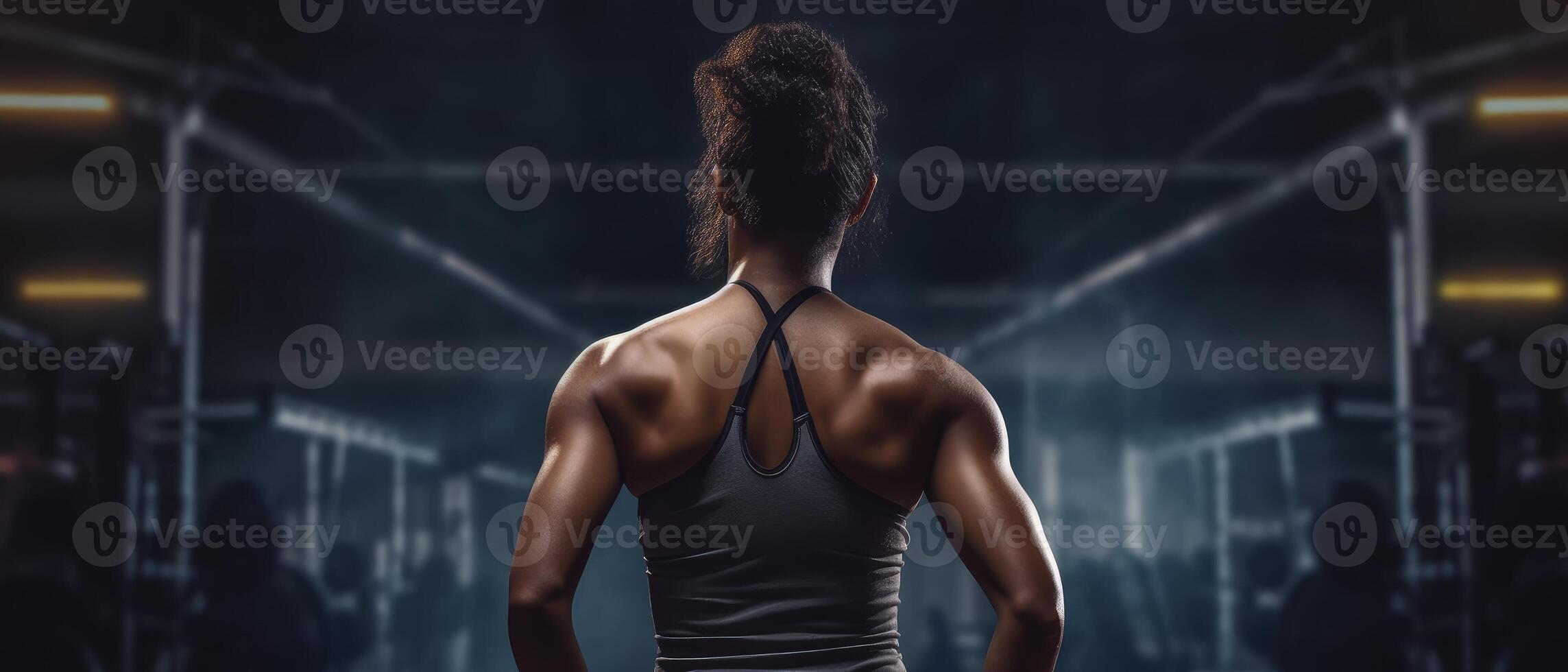 African american woman working out in gym on gym background, copy space for text or design. . photo