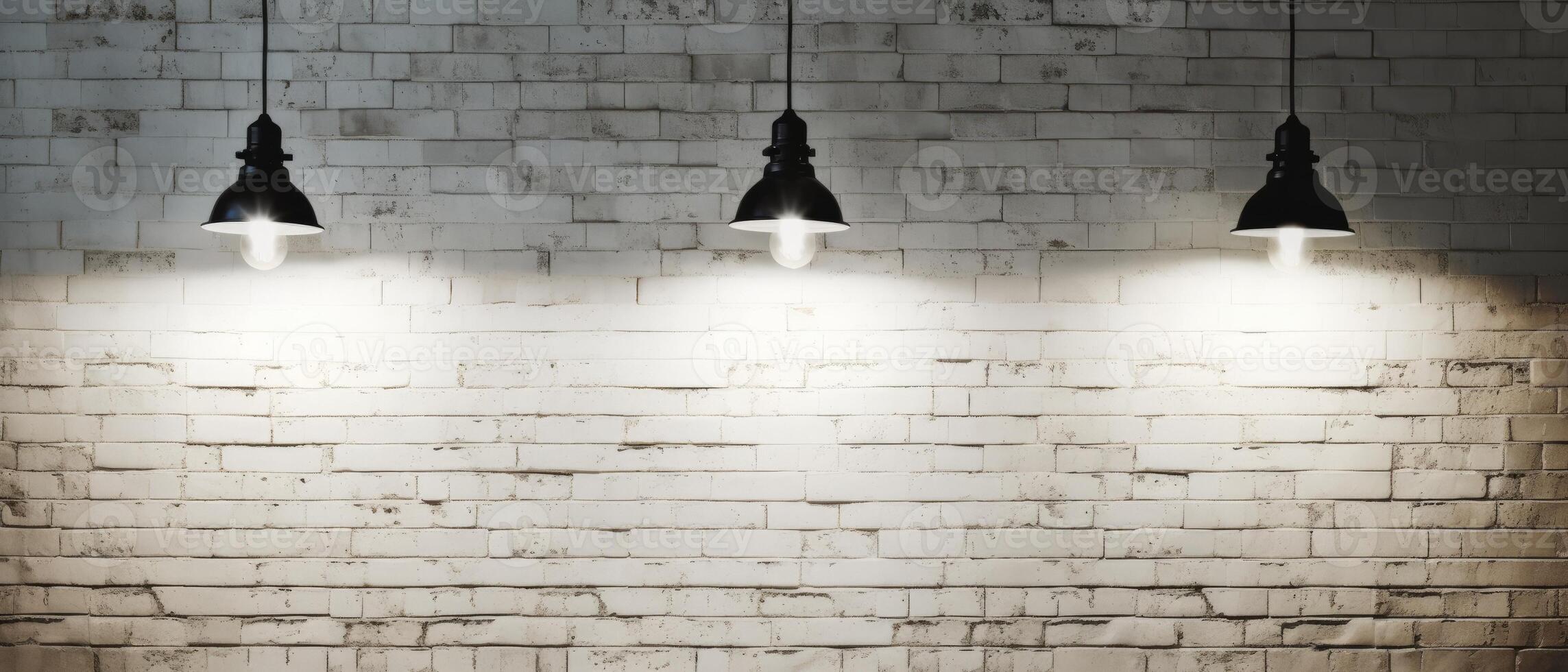 White brick wall with a lamp on the background of stone tiles. . photo