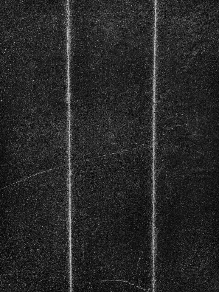 Beautiful Black grunge folded texture. Folded paper background with scratches and dust. Old folded paper texture for your design. photo