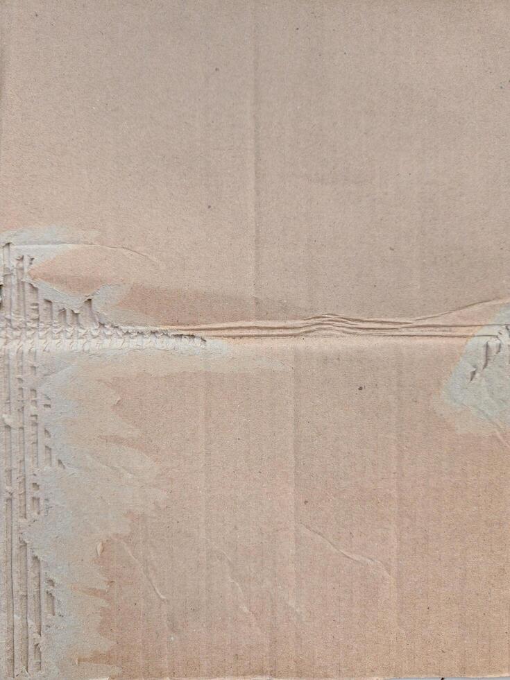 ripped cardboard texture for poster. torn card board photo