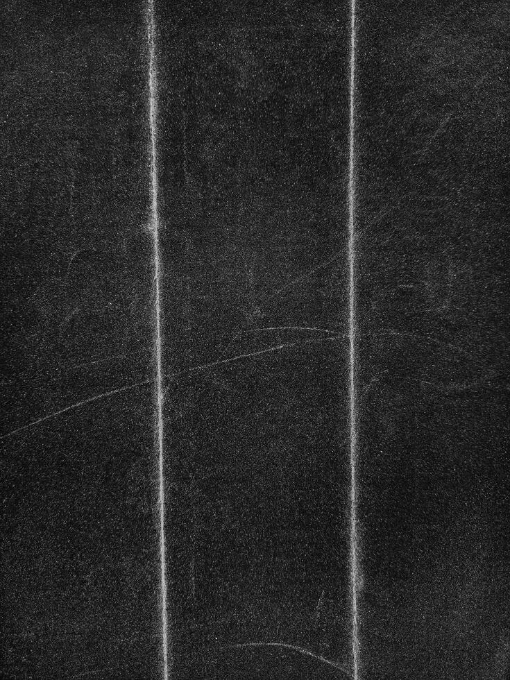 Folded paper with grungy texture in black background. can be used to replicate the aged and worn look for your creative design. old paper for photo texture overlay in retro style