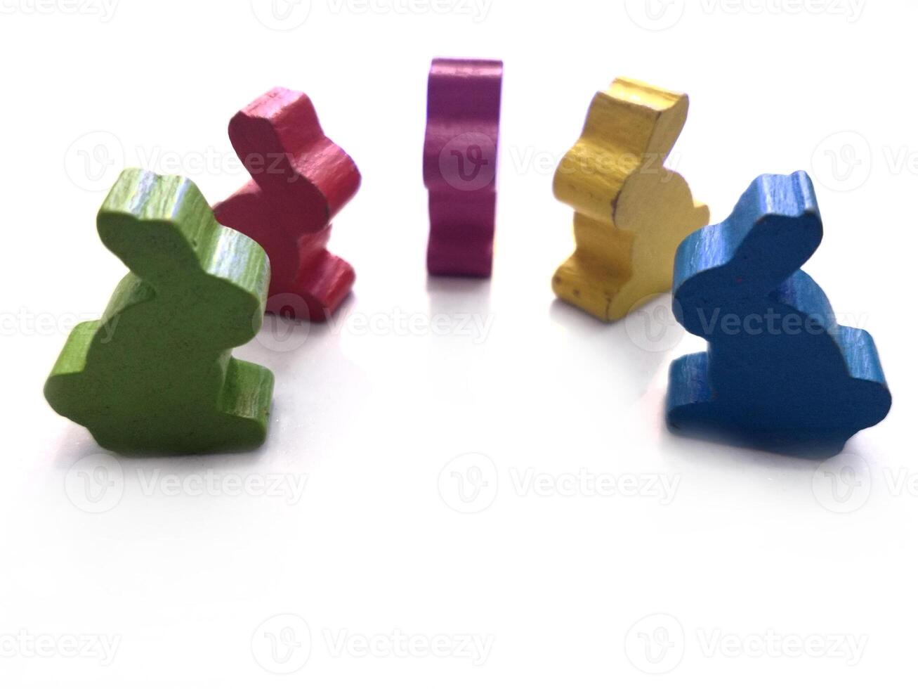 colorful rabbits bunny toys isolated in white background. Easter greeting card concept photo