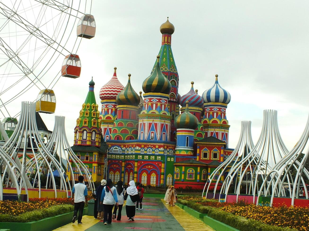 Sumedang, West Java, Indonesia, May 24, 2024. view landscape of a tourist spot called Jatinangor amusement Park, with magnificent and beautiful building with colorful paint photo