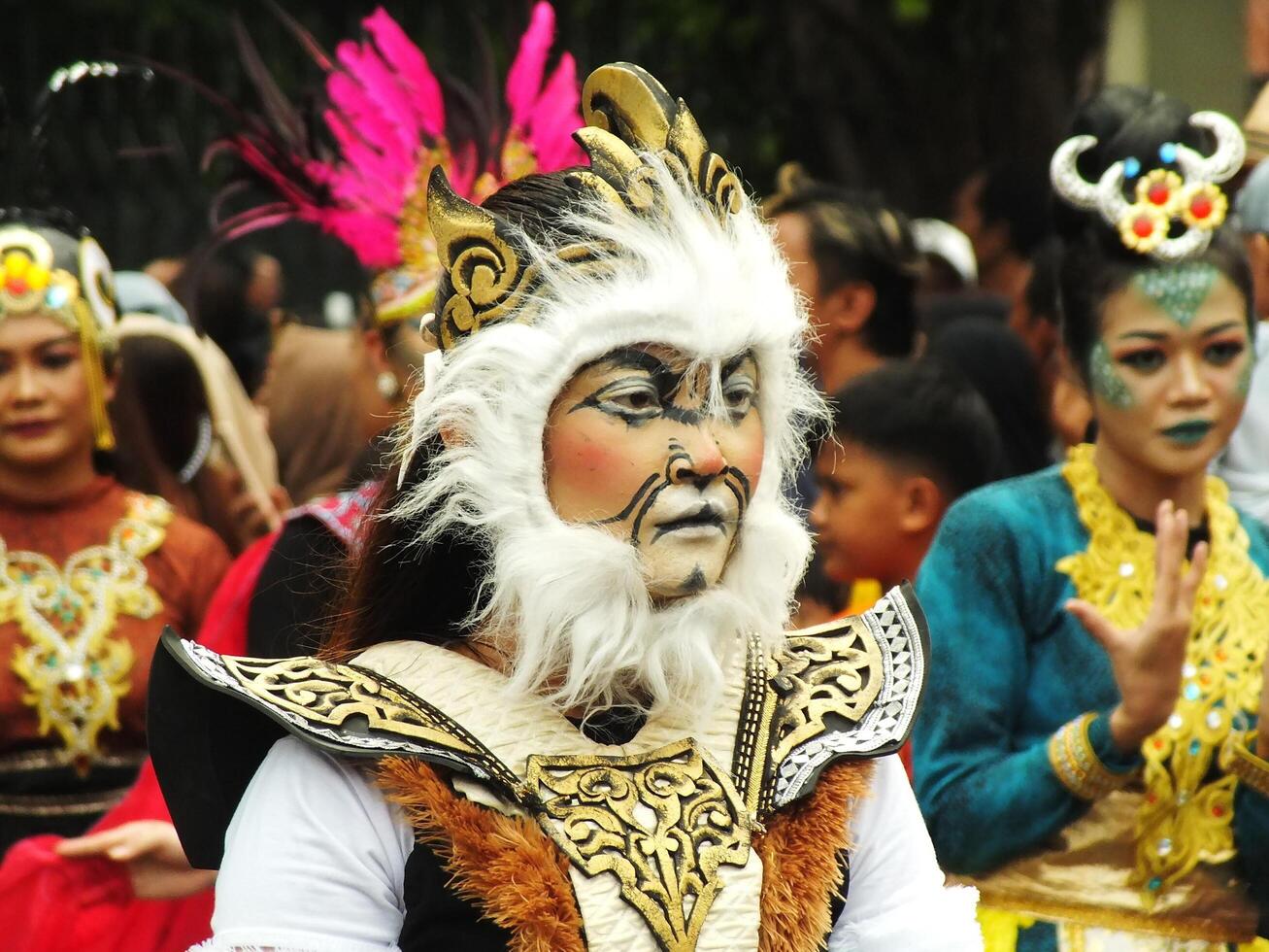 Surakarta City, Central Java, Indonesia, May 15, 2024. Tourist attraction on a traditional costume parade at Slamet Riyadi Street. photo