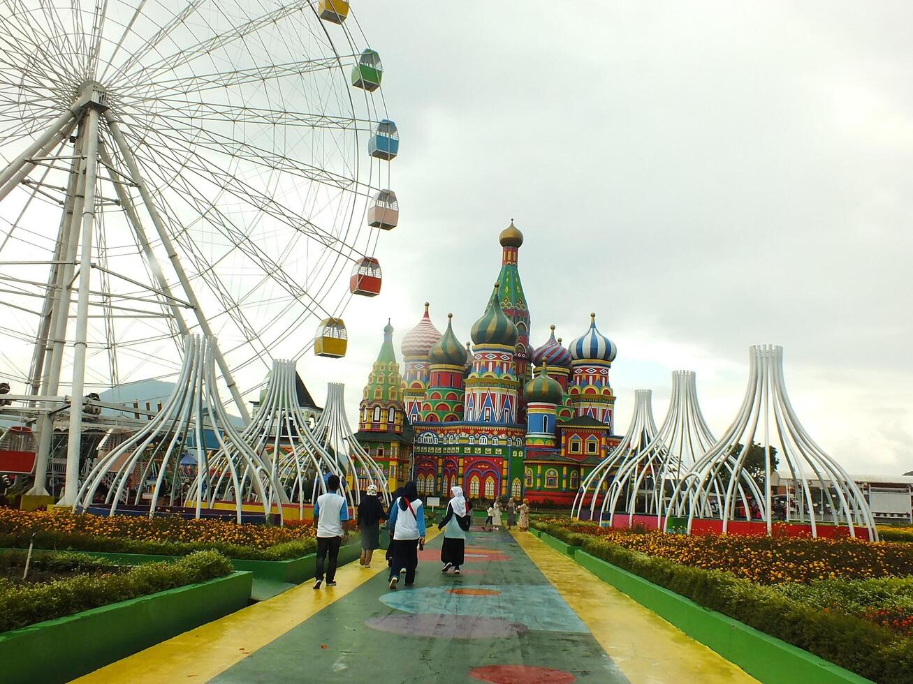 Sumedang, West Java, Indonesia, May 24, 2024. view landscape of a tourist spot called Jatinangor amusement Park, with magnificent and beautiful building with colorful paint photo