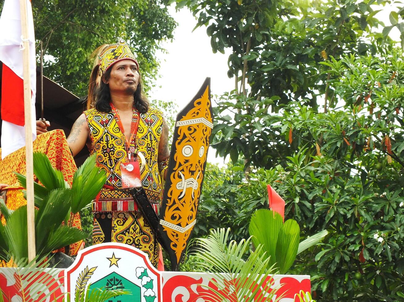 Surakarta City, Central Java, Indonesia, May 15, 2024. Tourist attraction on a traditional costume parade at Slamet Riyadi Street. photo