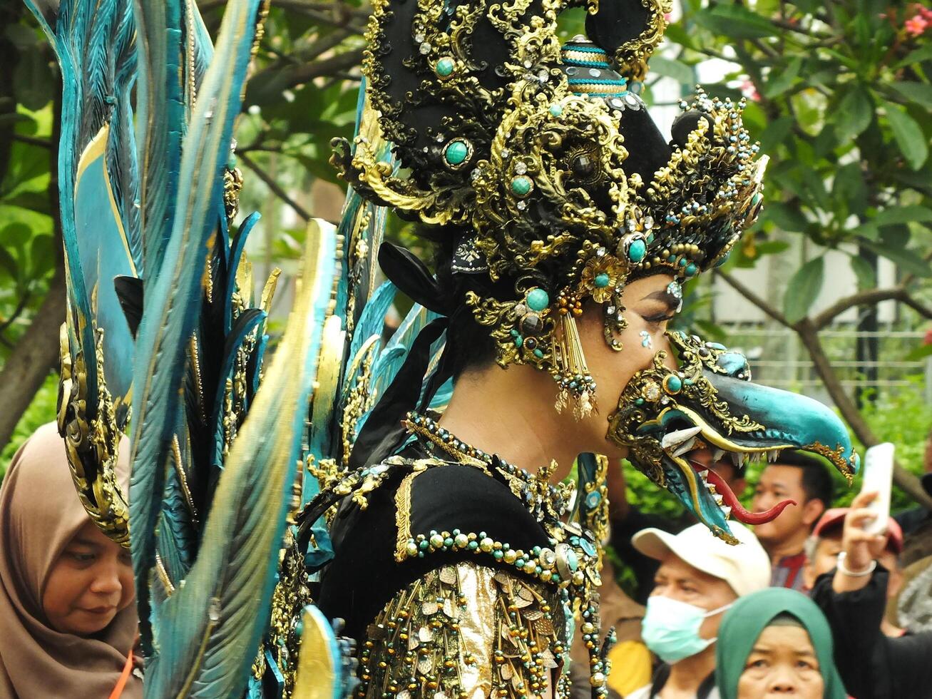 Surakarta City, Central Java, Indonesia, May 15, 2024. Tourist attraction on a traditional costume parade at Slamet Riyadi Street. photo