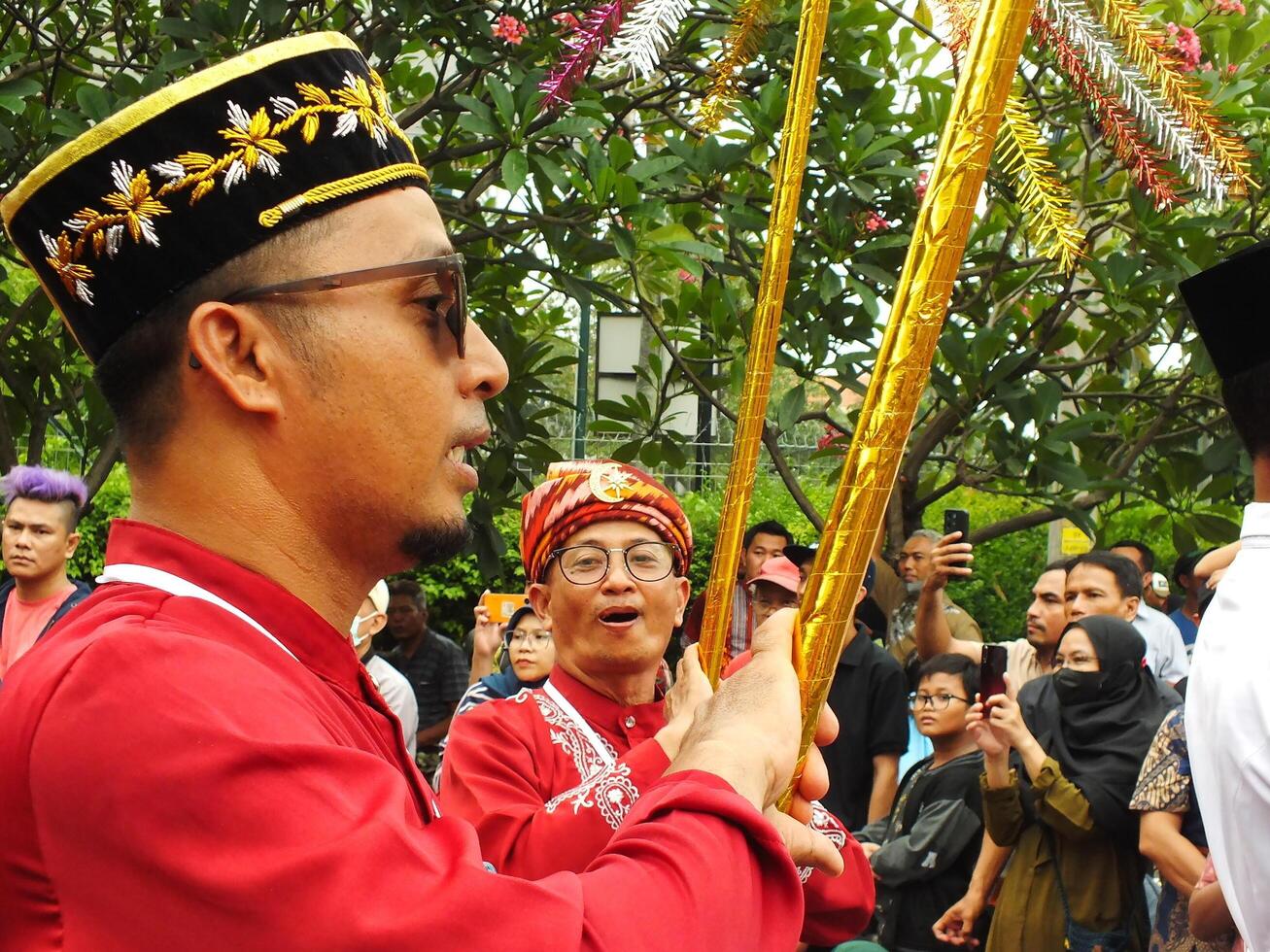 Surakarta City, Central Java, Indonesia, May 15, 2024. Tourist attraction on a traditional costume parade at Slamet Riyadi Street. photo