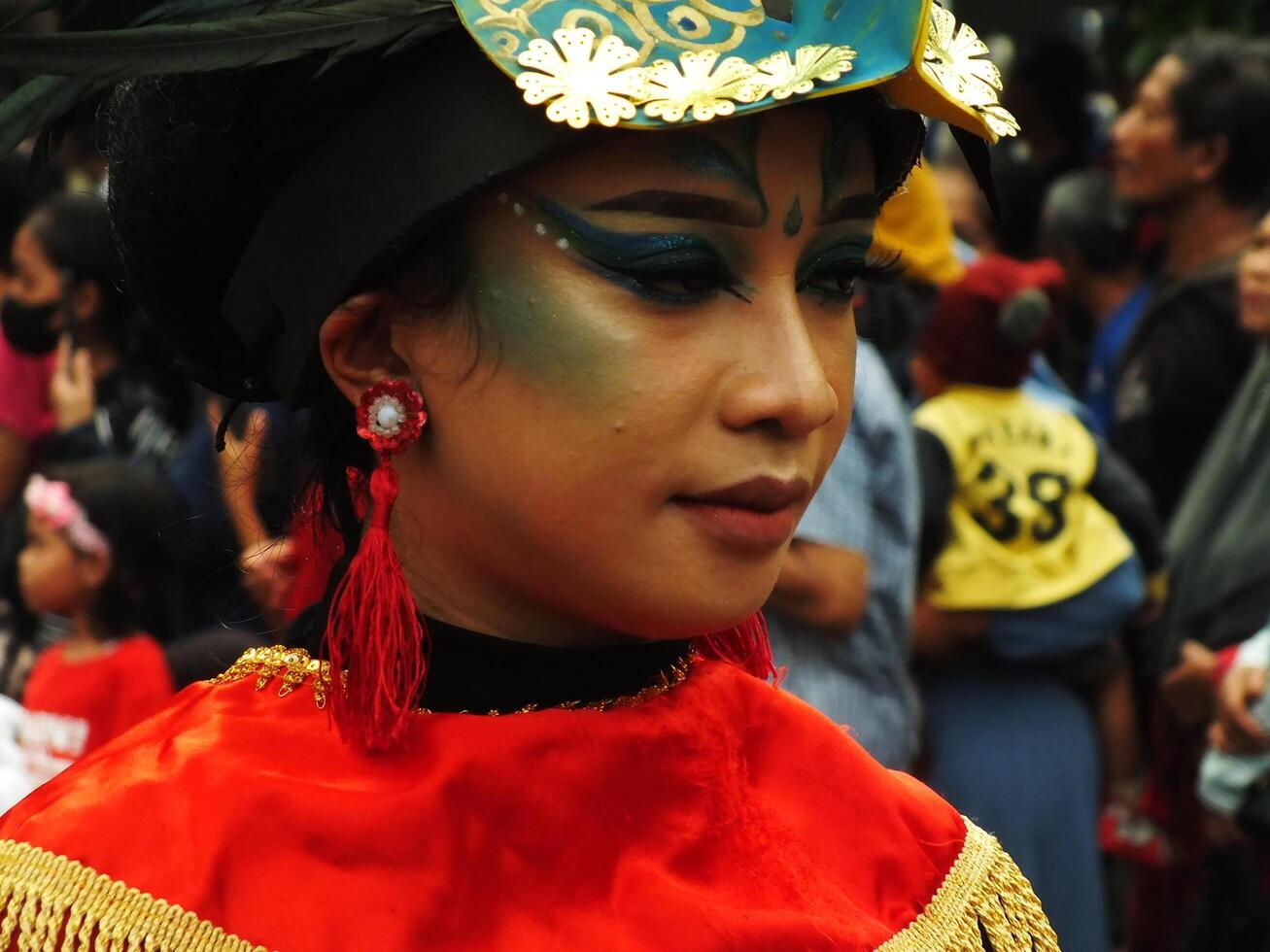 Surakarta City, Central Java, Indonesia, May 15, 2024. Tourist attraction on a traditional costume parade at Slamet Riyadi Street. photo