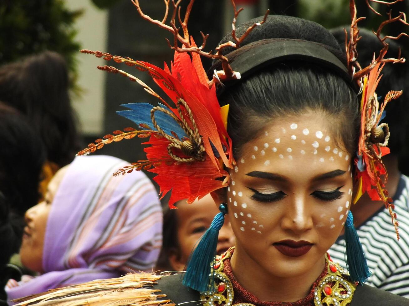 Surakarta City, Central Java, Indonesia, May 15, 2024. Tourist attraction on a traditional costume parade at Slamet Riyadi Street. photo