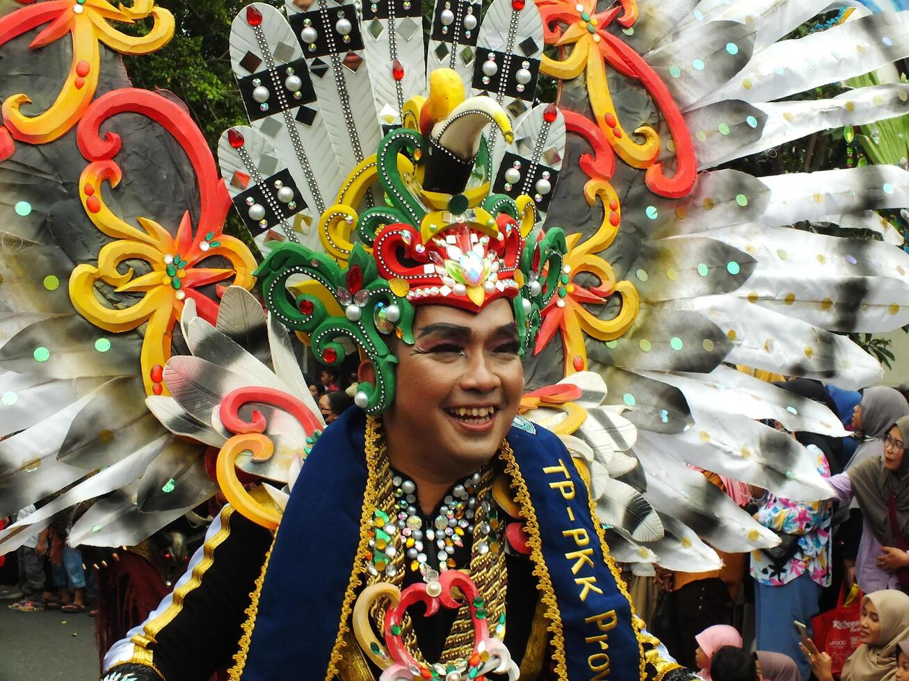 Surakarta City, Central Java, Indonesia, May 15, 2024. Tourist attraction on a traditional costume parade at Slamet Riyadi Street. photo