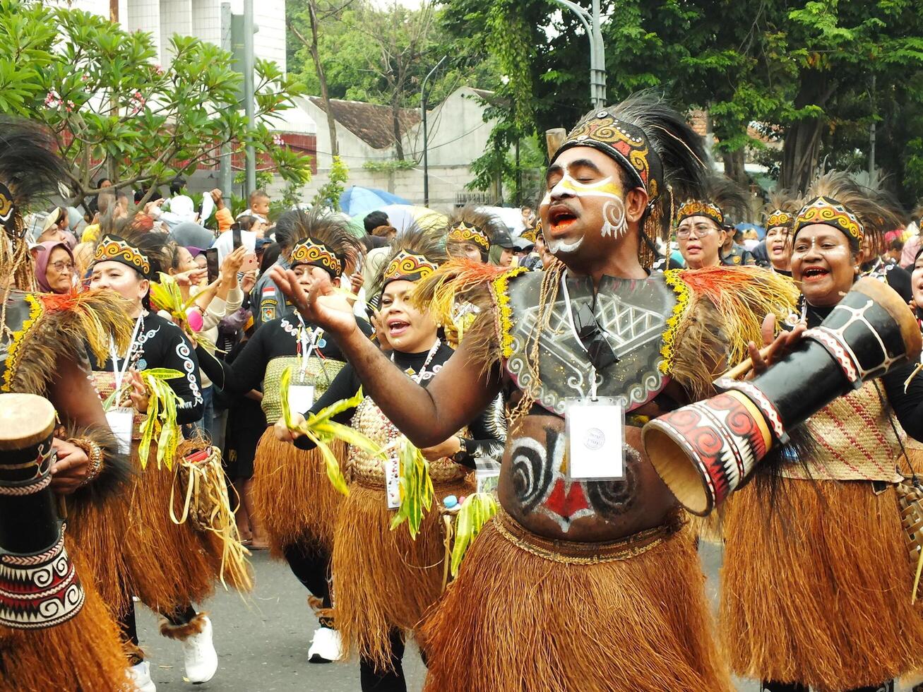 Surakarta City, Central Java, Indonesia, May 15, 2024. Tourist attraction on a traditional costume parade at Slamet Riyadi Street. photo