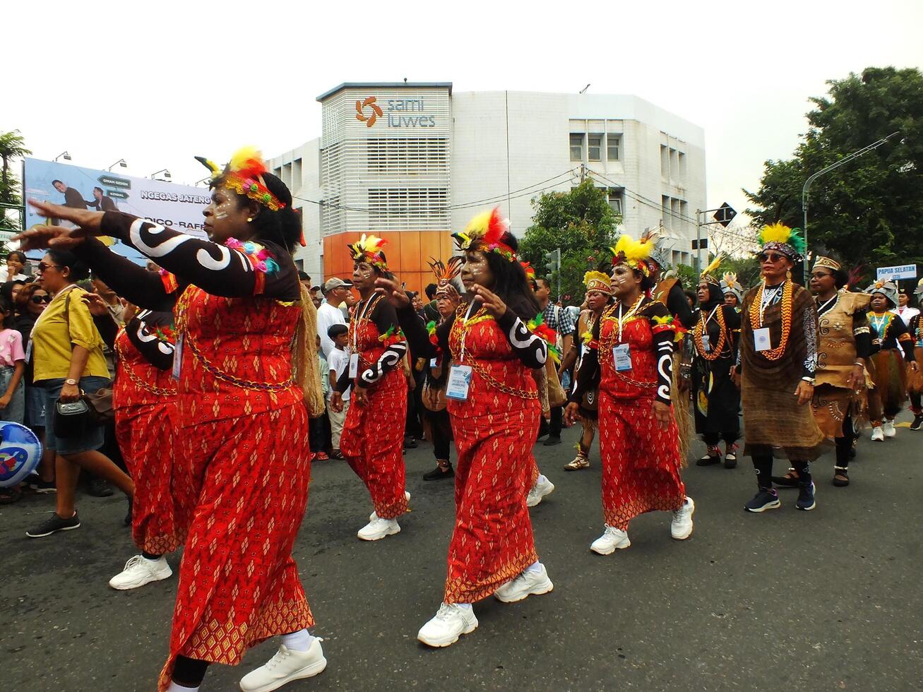 Surakarta City, Central Java, Indonesia, May 15, 2024. Tourist attraction on a traditional costume parade at Slamet Riyadi Street. photo