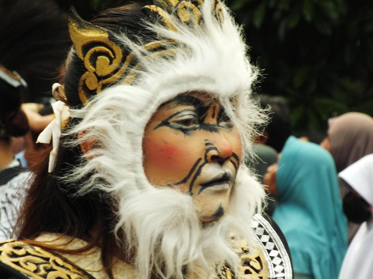 Surakarta City, Central Java, Indonesia, May 15, 2024. Tourist attraction on a traditional costume parade at Slamet Riyadi Street. photo