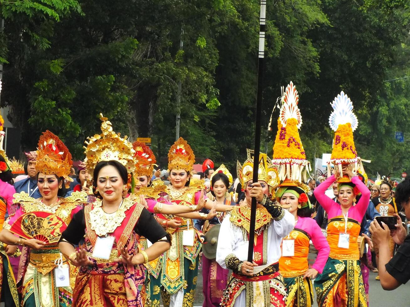 Surakarta City, Central Java, Indonesia, May 15, 2024. Tourist attraction on a traditional costume parade at Slamet Riyadi Street. photo