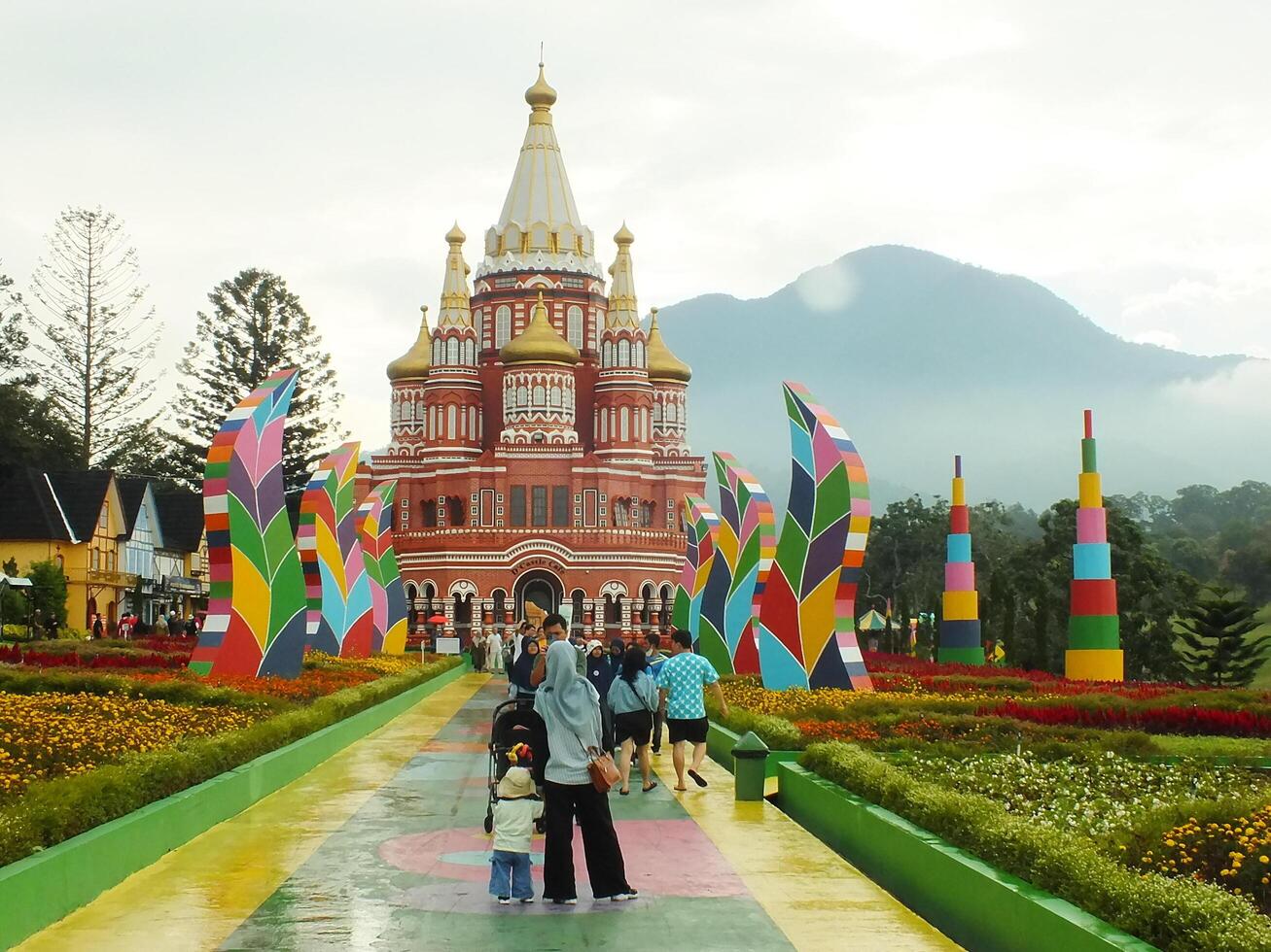 Sumedang, West Java, Indonesia, May 24, 2024. view landscape of a tourist spot called Jatinangor amusement Park, with magnificent and beautiful building with colorful paint photo