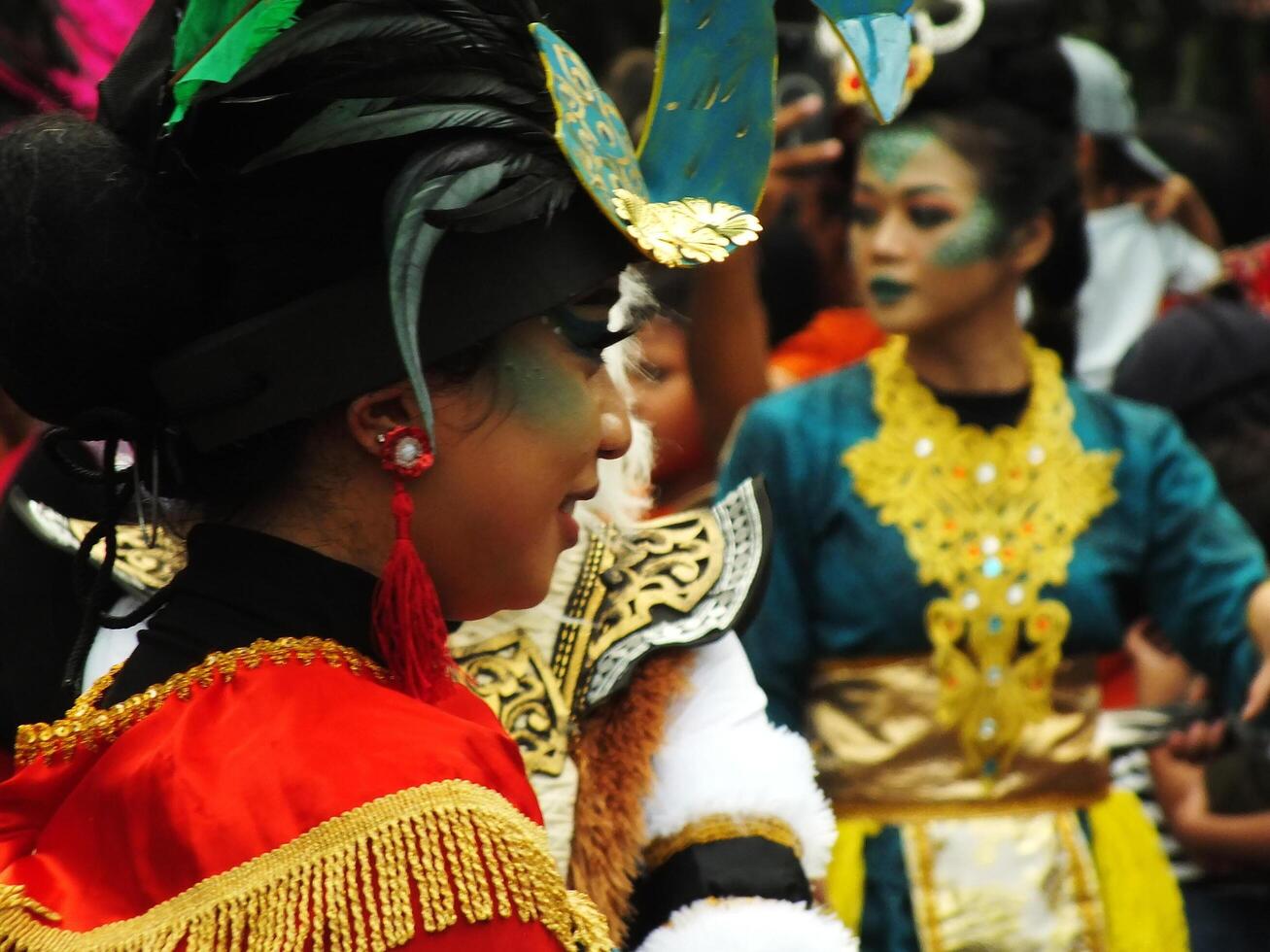 Surakarta City, Central Java, Indonesia, May 15, 2024. Tourist attraction on a traditional costume parade at Slamet Riyadi Street. photo