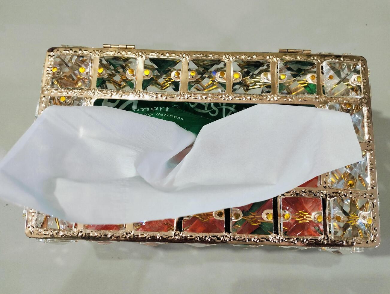 Crystal tissue box designed to adorn dining room settings with sophistication photo