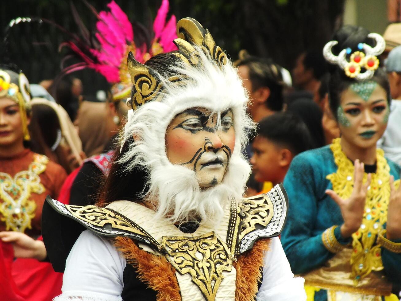 Surakarta City, Central Java, Indonesia, May 15, 2024. Tourist attraction on a traditional costume parade at Slamet Riyadi Street. photo